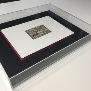 PIECE FRAMED BY APEX ART LAB IN CUSTOM ACRYLIC BOX