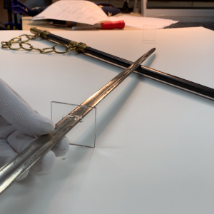 Apex Art Lab - Archival object mount of a Navy Officer Sword.